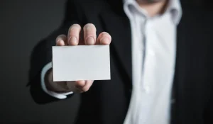 a person holding a card